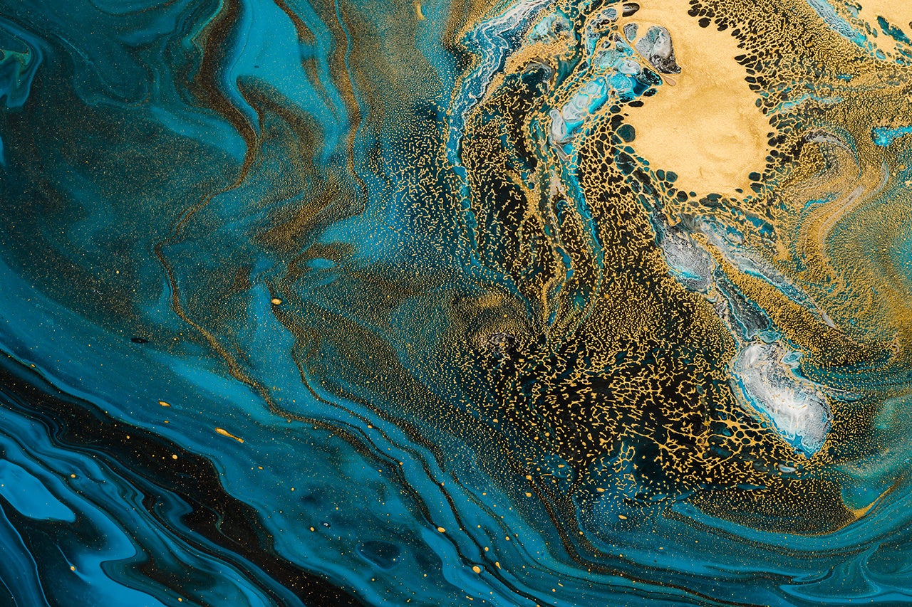 Acrylic Fluid Art. Blue waves and gold inclusion. Abstract stone background or texture.