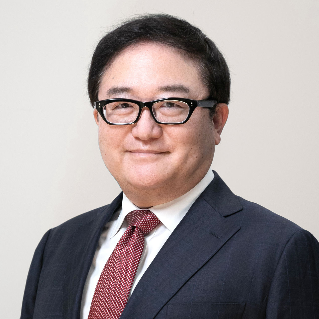塚本卓治