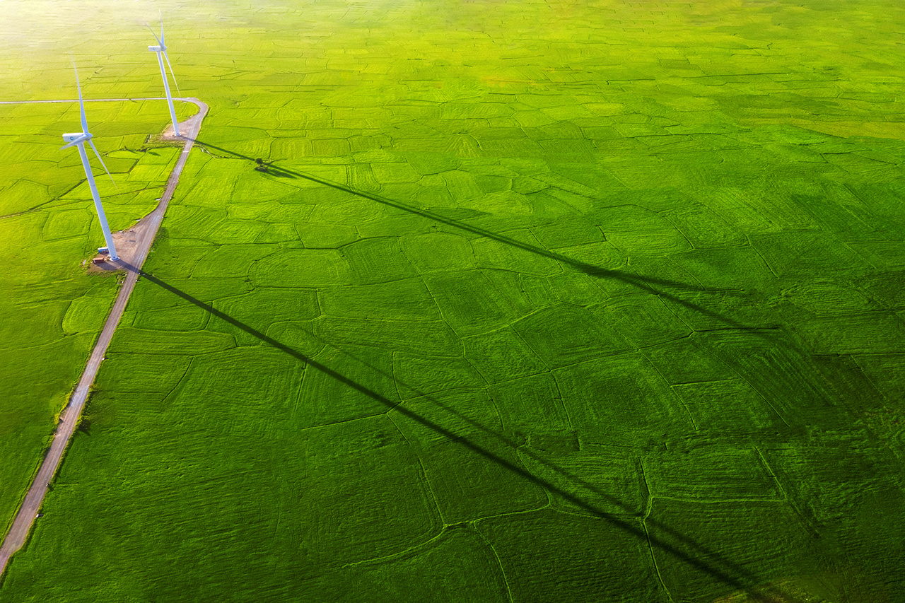 Landscape with Turbine Green Energy Electricity, Windmill for electric power production, Wind turbines generating electricity on rice field at Phan Rang, Ninh Thuan, Vietnam. Clean energy concept.