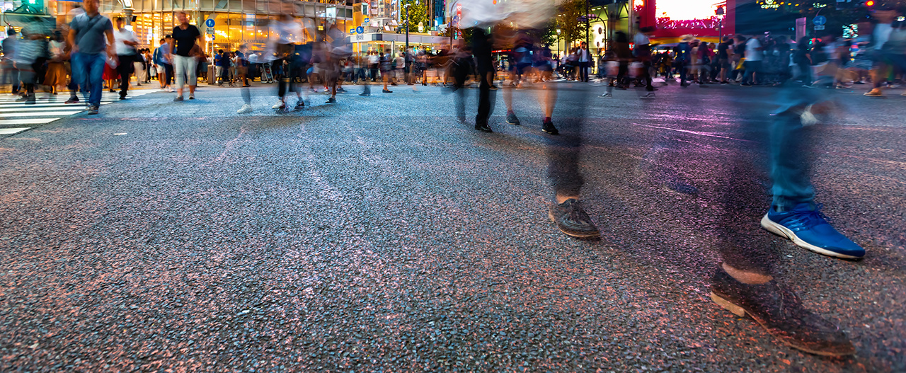 Pedestrians cross the Shibuya Scramble crosswalk in Tokyo, Japan, one of the busiest intersections in the world