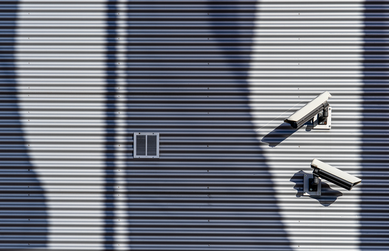 Close-up Of Electric Camera Against Wall