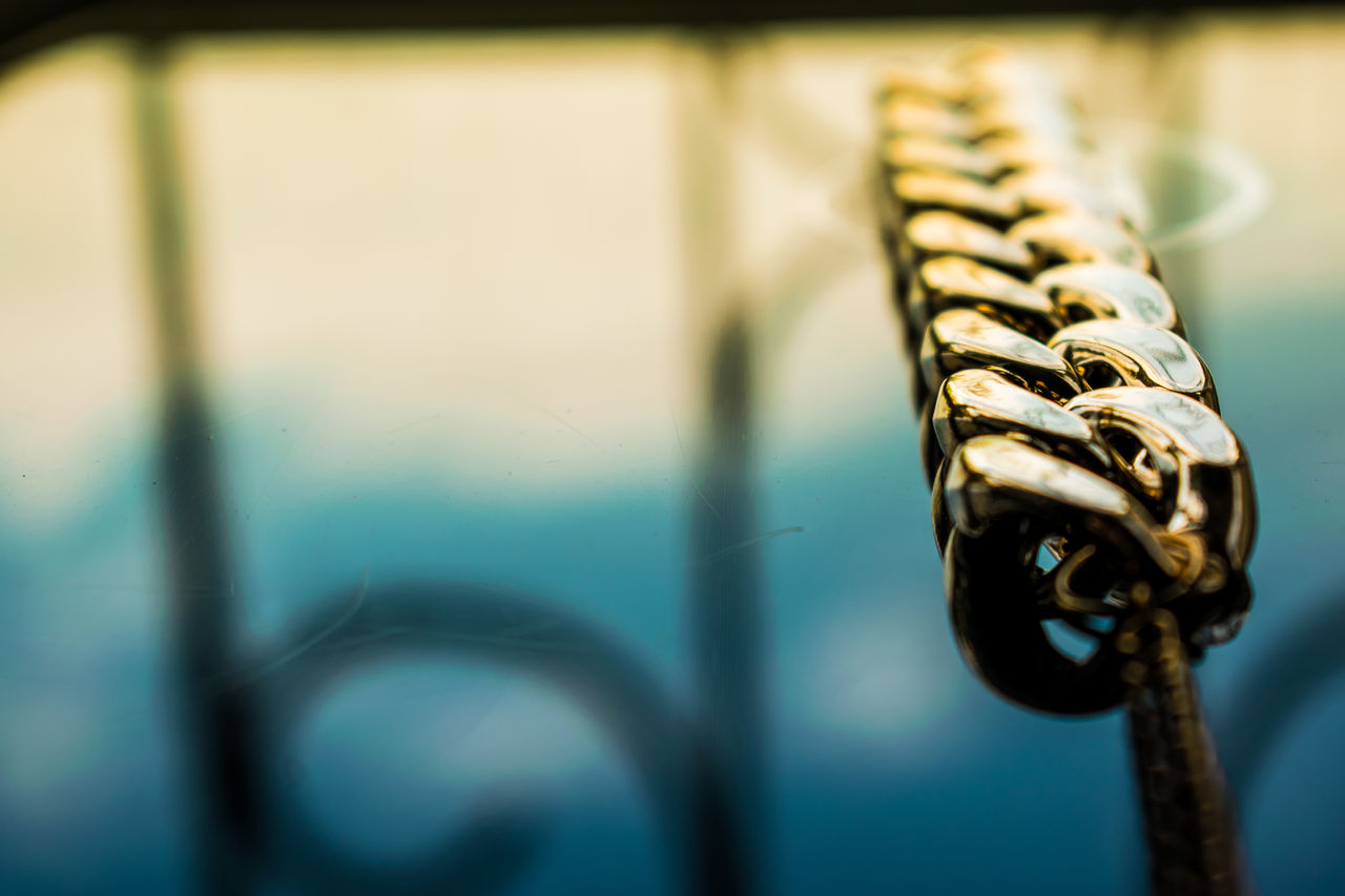 Gold jewelry is yellow and different shades. Jewelry from metal alloy with openwork patterns on the reflective surface. Stylish and fashionable design., Gold jewelry is yellow and different shades. Jewelry from metal 