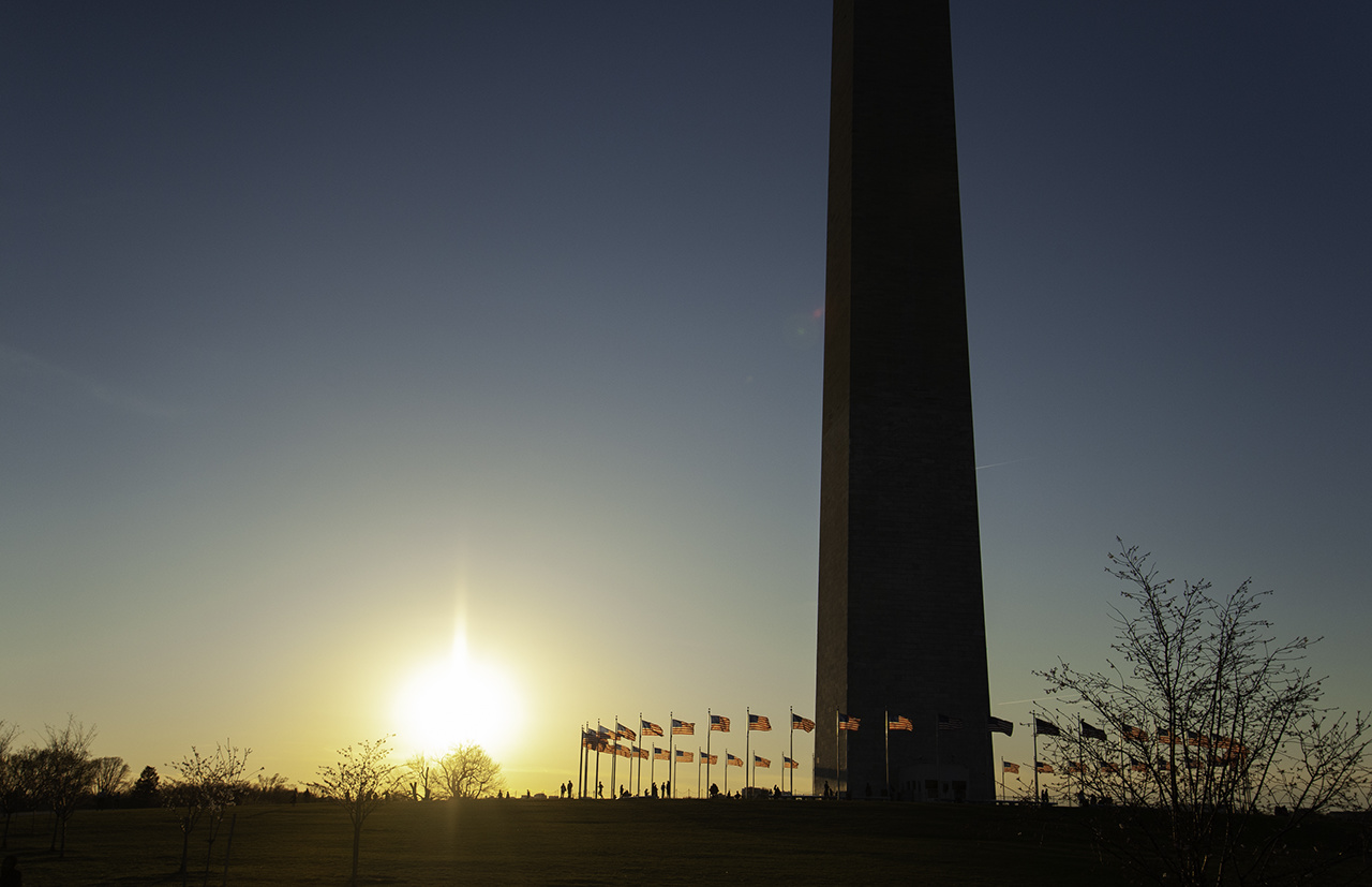 Silhouette of the Washington Monument at sunset in DC