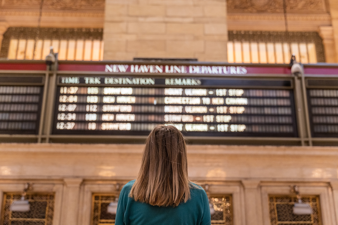 timetable checking before the train ride in new york