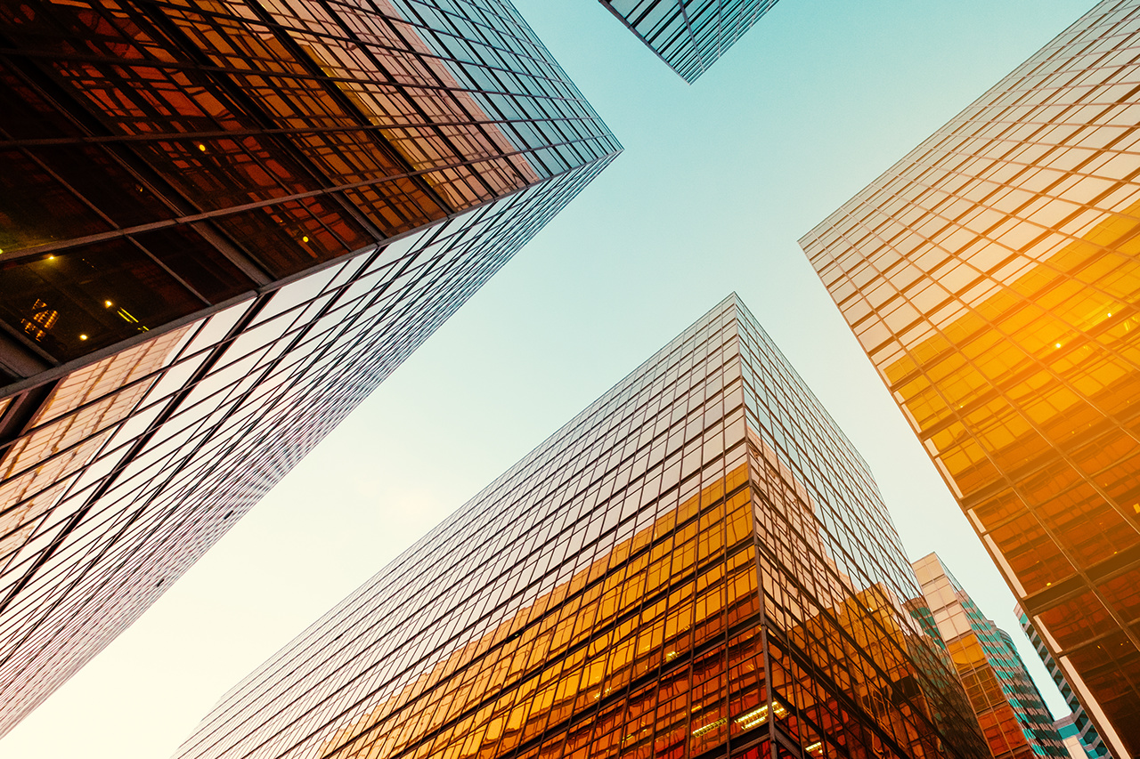 office buildings and blue sky in business district -