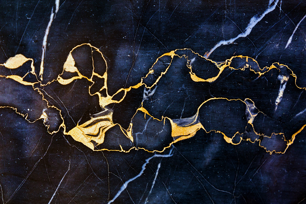 Golden Veins in Dark Marble Stone Luxury