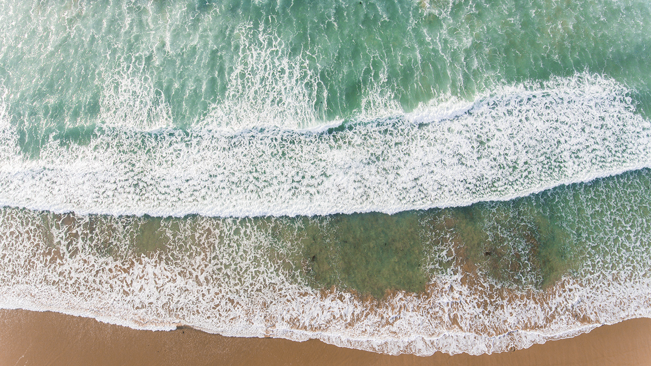 Aerial View of Waves and Beaches at Sunset Along the Great Ocean Road, Australia