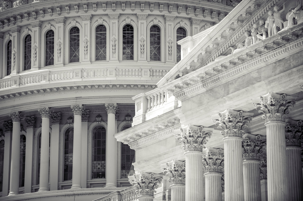 Close-up architectural detail view of the US Capitol Building dome with ornate classical columns of the exterior of the Senate building in Washington DC, USA, Close-up architectural detail view of the US Capitol Building do