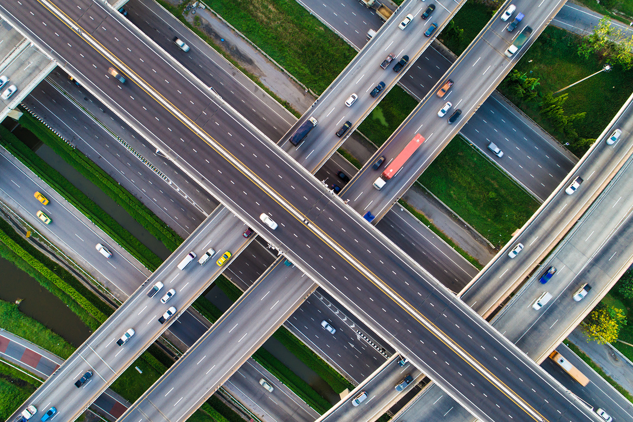 Look down view of traffic cross intersection road with vehicle movement transport concept