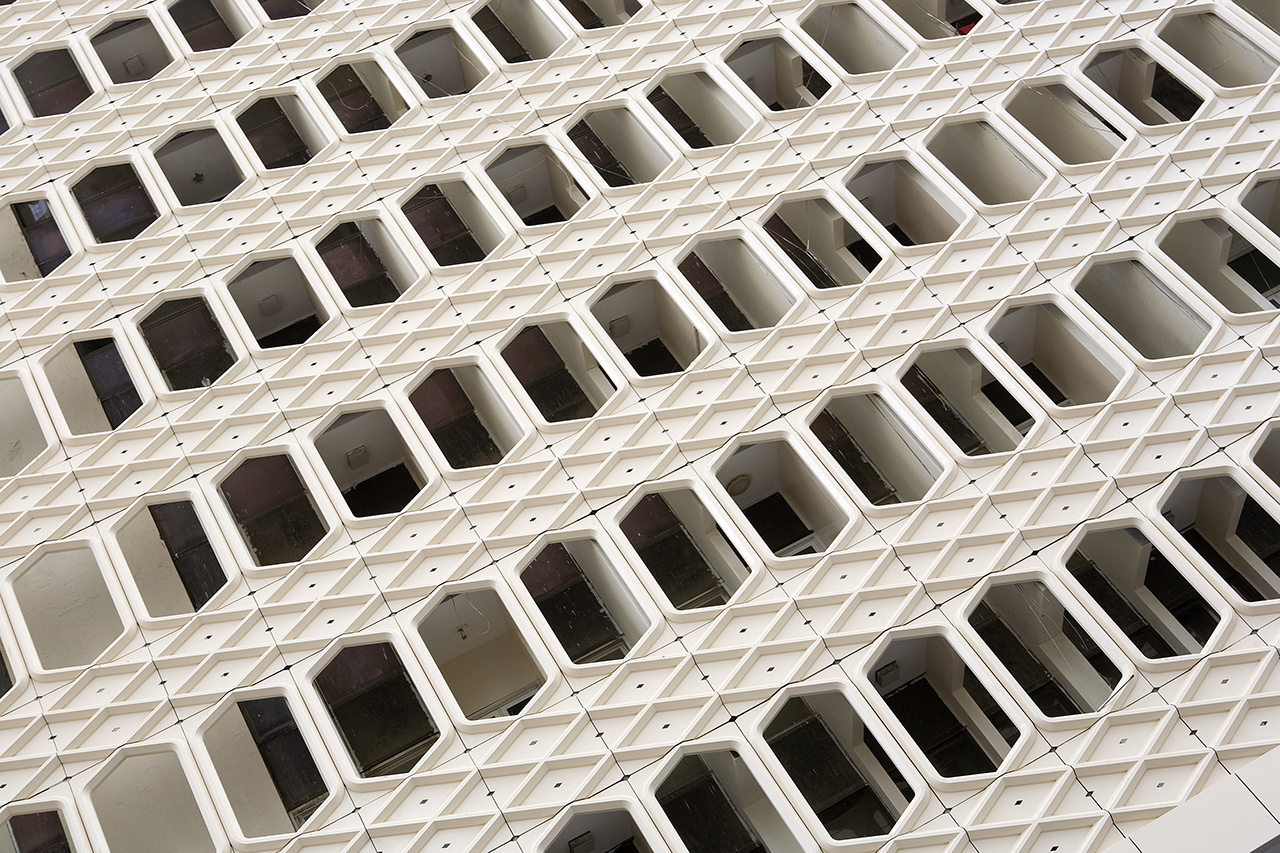 Facade of flat building in Arabian style in Dubai, UAE.