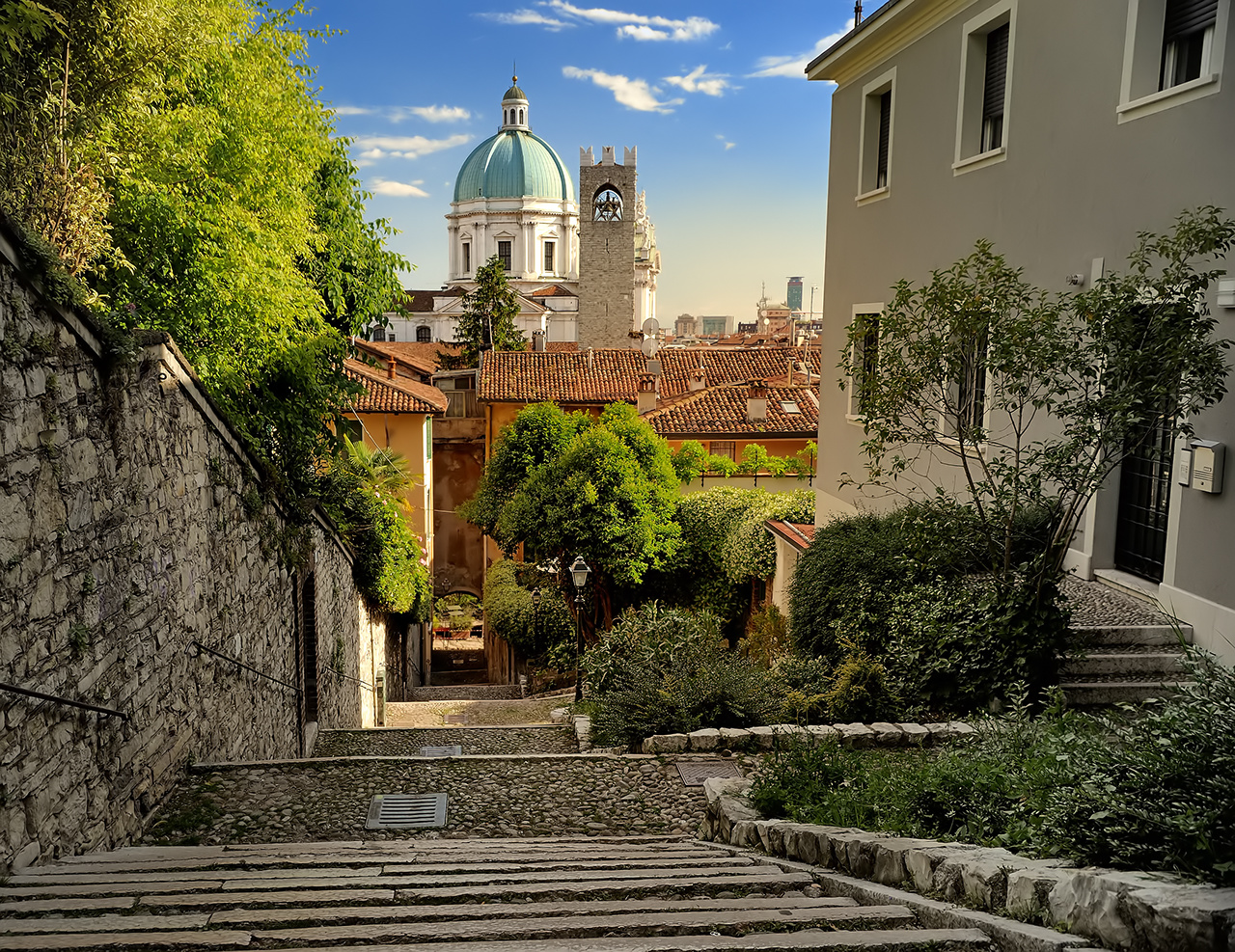 Beautiful sunset view of the Duomo cupola over the town Brescia in Lombardy. Travel by Italy.