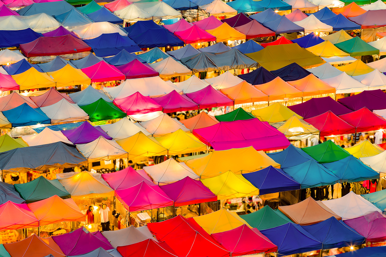 Multiple colour aerial view night flea market, cityscaep downtown