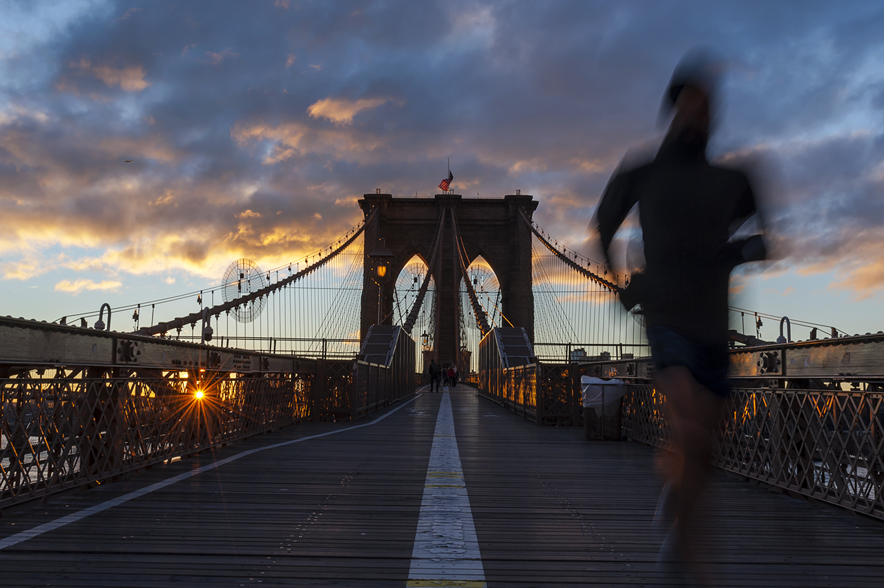 Brooklyn Bridge Early in the Morning, New York City. Beautiful Sunrise over this famous United States Landmark.