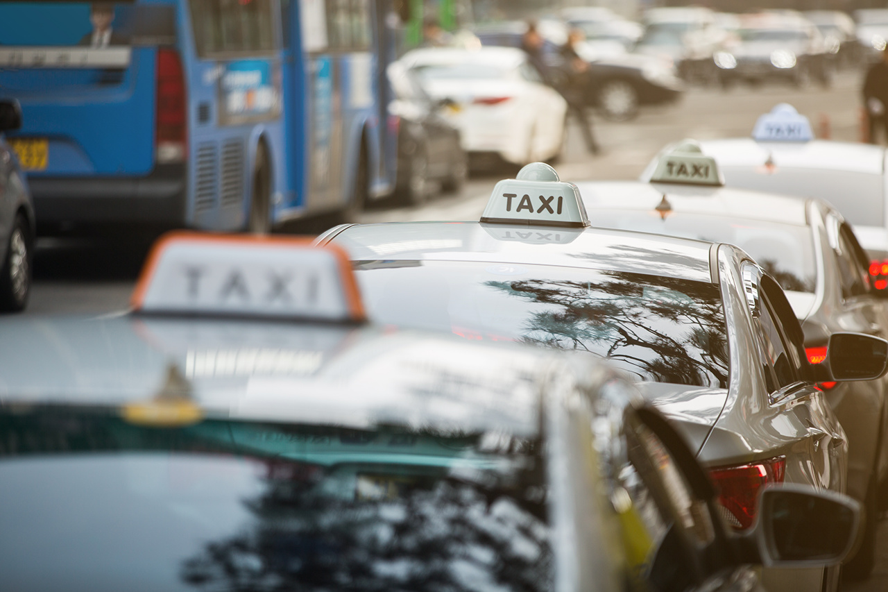 Taxi stand in a row on a city street